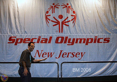 The big photo is Mike in front of the NJ Special Olympic banner